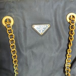 Prada purse with gold chain straps, 3 sections inside